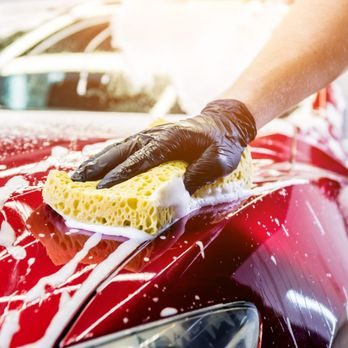 A-1 HANDWASH team member carefully hand washing a vehicle in Sacramento